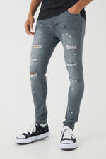 Load image into Gallery viewer, Skinny Stretch Rip &amp; Repair Paint Splatter Jeans
